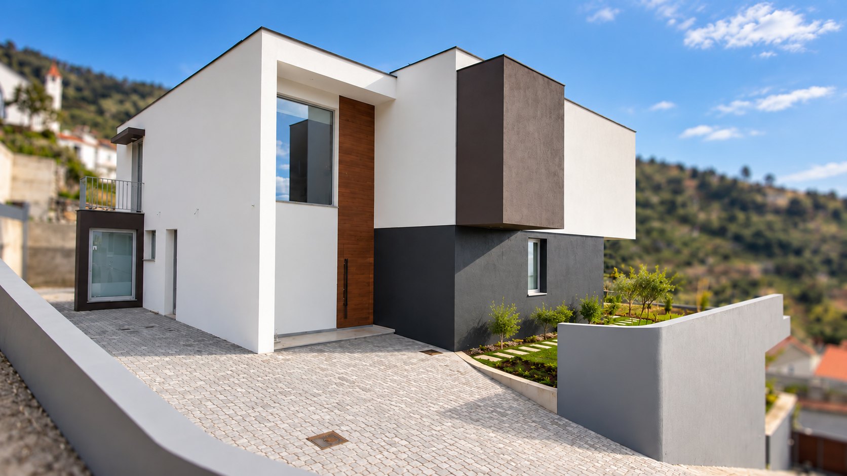 Moradia nova com muro curvo